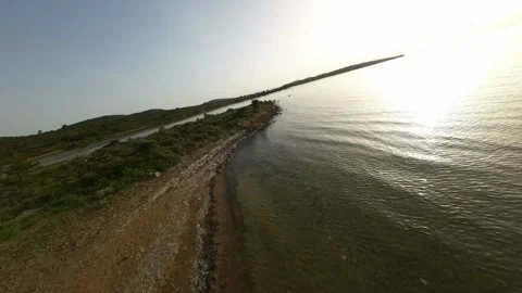 FPV drone flight on 1 April 2025 in Cunda, Ayvalik, Turkey along beach coast Stock-Footage 308067293