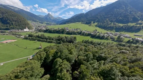 FPV drone flight on Austria mountain with forest Stock Footage 163509322