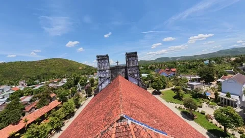 FPV drone flight between the twin bell towers of Mang Lang Church Stock Footage 341567209