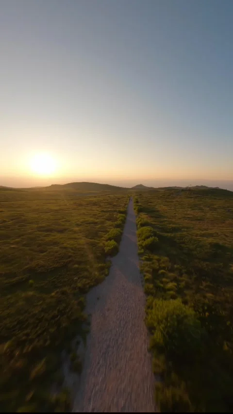 FPV drone flight following mountain trail at sunset on Vitosha, Sofia, Bulgaria. Stock Footage 341114861