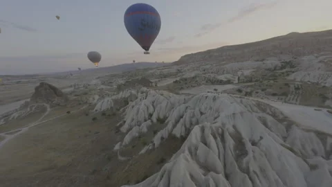 FPV Drone Flight – LOG Flat Version – Passing Through Hot Air Balloons Stock Footage 311078280