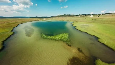 FPV Drone Flight Over Blue Lake in Montenegro Stock Footage 305801206