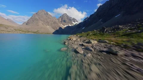 FPV Drone Flight Over Blue Lake in Norway – Scenic Mountain Nature Aerial Stock Footage 305803825