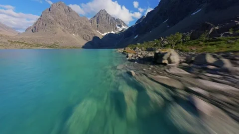 FPV Drone Flight Over Blue Lake in Norway – Scenic Aerial Nature Shot Stock Footage 305825055