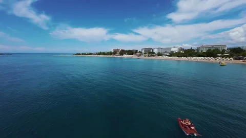 FPV Drone Flight Over Catamaran Near Beach Resorts Stock Footage 309039110