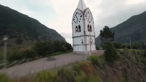 Fpv drone flight over the chapel in the mountains Stock Footage 168617582
