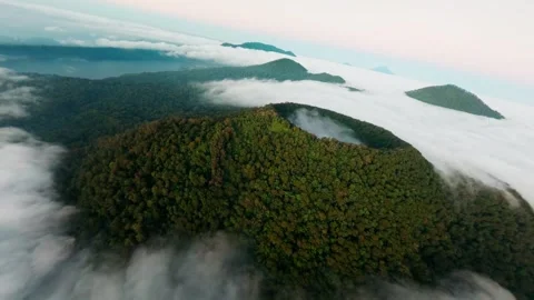FPV Drone Flight Over Cloud-Covered Volcano and Rainforest in Bali Stock Footage 305796418