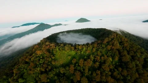 FPV Drone Flight Over Cloud-Covered Volcano and Rainforest in Bali Stock Footage 305796434
