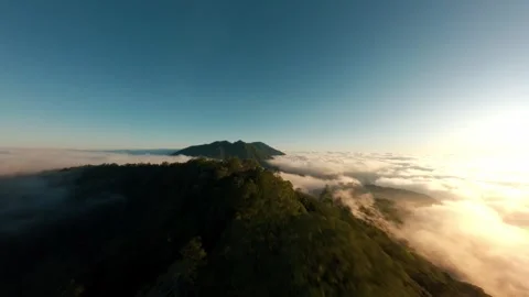FPV Drone Flight Over Cloud-Covered Volcano and Rainforest in Bali Stock Footage 305804667