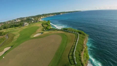 Fpv drone flight over golf course and dreamland beach in bali Stock-Footage 245252532