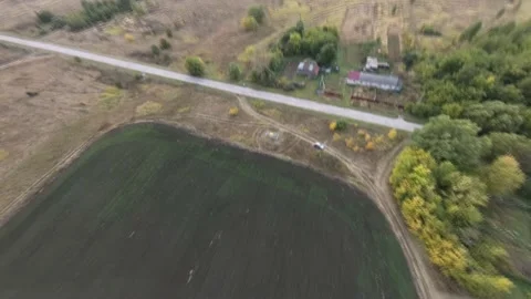 Fpv drone flight over a green field Stock Footage 222945747