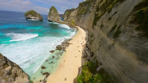 FPV drone flight over iconic Diamond Beach on Nusa Penida Island, Bali Indonesia Stock Footage 317504431