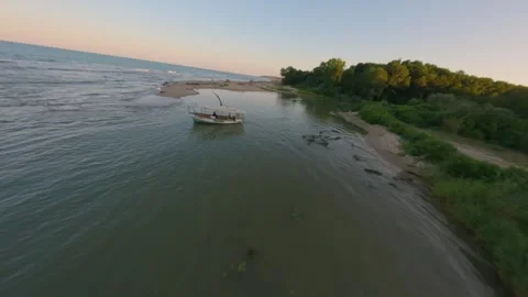 FPV drone flight over Kamchia River mouth toward Black Sea beach in Bulgaria. Stock Footage 342544764