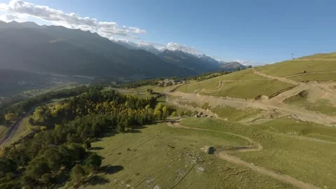 Fpv drone flight over mountain meadow forest and pickup Stock Footage 337100610