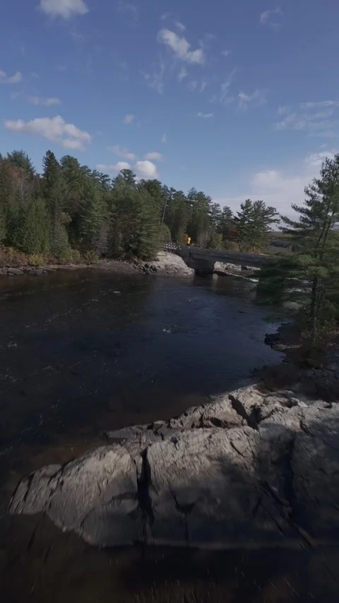 FPV Drone Flight Over Rawdon Cascades, Under Bridge and Dynamic Aerial Maneuvers Stock Footage 290967270