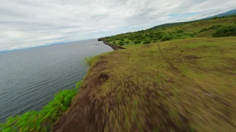 FPV drone flight over rocky shore Stock Footage 248817386