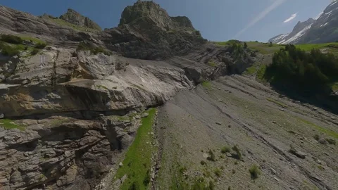 FPV Drone Flight Over Rugged Swiss Mountain With Visible Rock Layers 스톡 동영상 312827594