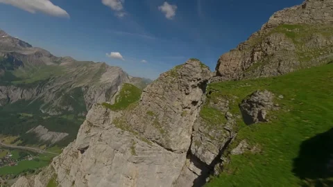 FPV Drone Flight Over Rugged Alpine Rocky Cliffs Stock Footage 312956825