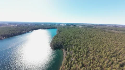 FPV Drone Flight Over Sääksjärvi Lake and Boreal Forest in Finland Stock Footage 335885333