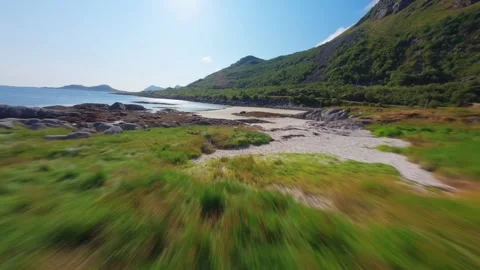 FPV Drone Flight Over Sandy Beach in Lofoten, Norway Video stock 305802774