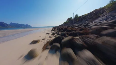FPV Drone Flight Over Sandy Beach in Lofoten, Norway Video stock 305802911