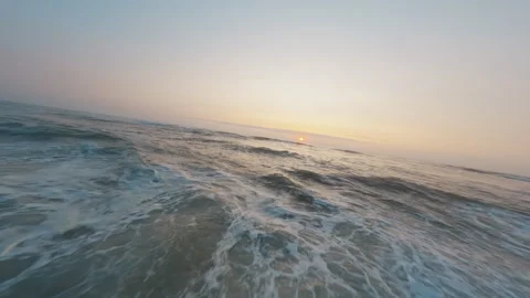 FPV Drone Flight Over Sandy Beach Waves at Sunset in Portugal Stock Footage 327414574