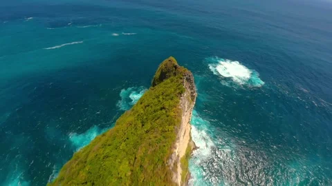 FPV drone flight over scenic cliffs and turquoise sea on Nusa Penida Island Bali Stock Footage 308725939