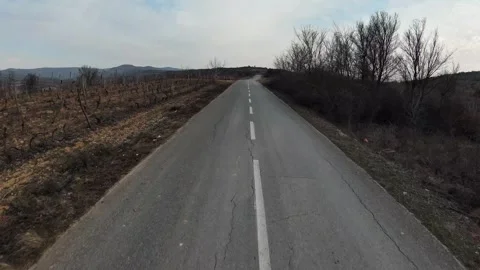 FPV Drone Flight Over Scenic Countryside Road in Macedonia Video stock 327931623