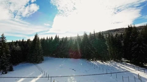 FPV Drone Flight over the Snowy Mountains of Romania 動画素材 264810272