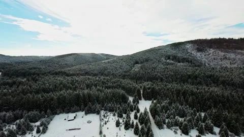 FPV Drone Flight over the Snowy Mountains of Romania 動画素材 264810511