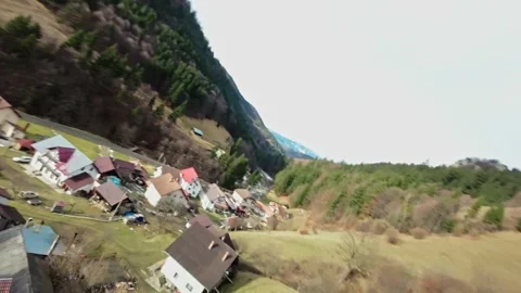 FPV Drone Flight over the Snowy Mountains of Romania 動画素材 264810590