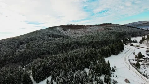 FPV Drone Flight over the Snowy Mountains of Romania 動画素材 264810787