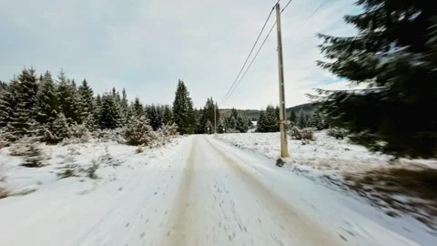 FPV Drone Flight over the Snowy Mountains of Romania 動画素材 264811441