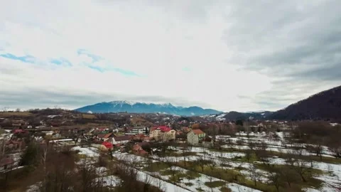 FPV Drone Flight over the Snowy Mountains of Romania 動画素材 264811605