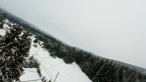FPV Drone Flight over the Snowy Mountains of Romania 動画素材 264812045