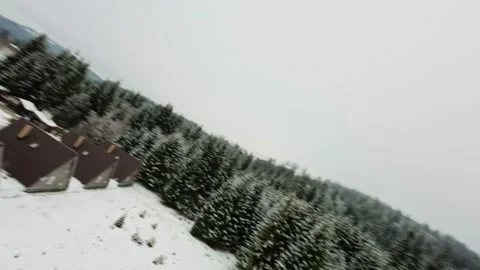 FPV Drone Flight over the Snowy Mountains of Romania 動画素材 264812212