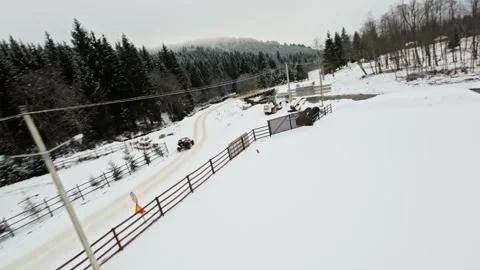 FPV Drone Flight over the Snowy Mountains of Romania 動画素材 264812220