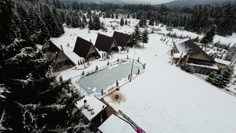 FPV Drone Flight over the Snowy Mountains of Romania 動画素材 264812735
