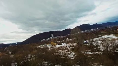 FPV Drone Flight over the Snowy Mountains of Romania 動画素材 264813036