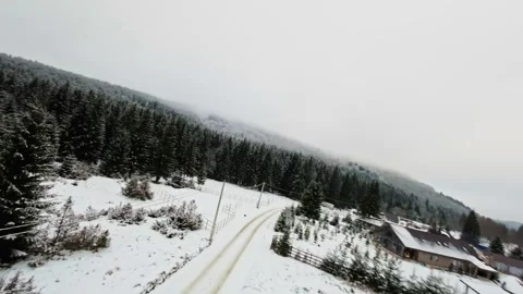 FPV Drone Flight over the Snowy Mountains of Romania 動画素材 264813219