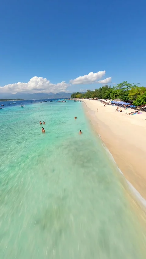 FPV drone flight over tropical beach and turquoise sea, Gili Trawangan Indonesia Stock Footage 322550341