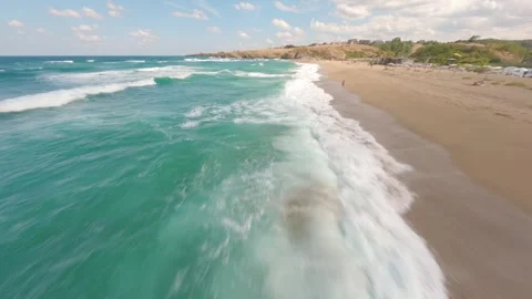 FPV drone flight over waves along Veleka Beach coastline, Bulgaria. Stock Footage 342584300
