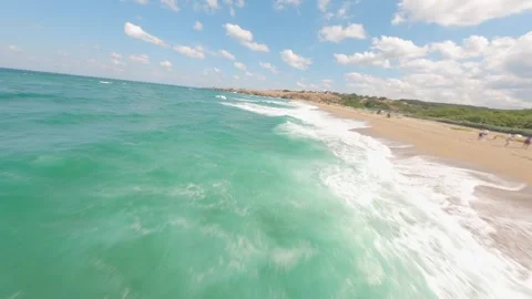 FPV drone flight over waves along Veleka Beach on the Black Sea, Bulgaria. Stock Footage 342737782