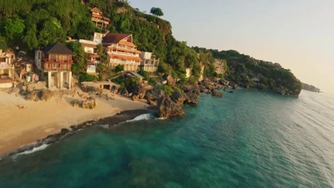 Fpv drone flight over the white sand beach at sunset in bali Stock-Footage 245363098