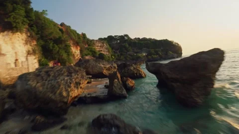 Fpv drone flight over the white sand beach at sunset in bali Stock-Footage 245363100