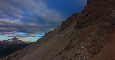 FPV drone flight sweeping just above rugged Dolomite cliffs Stock-Footage 337515571