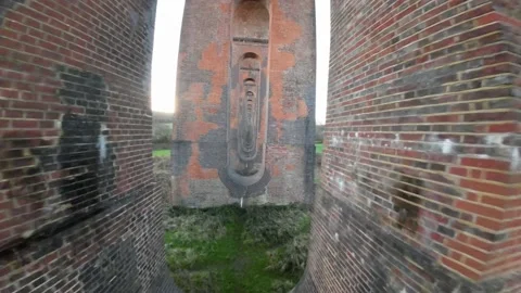 FPV Drone Flight Through Ouse Valley Viaduct Or Balcombe Viaduct, High speed fli Stock Footage 170249403
