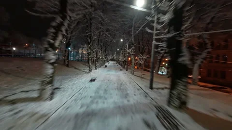 FPV drone flight through picturesque evening winter city. Night lights Stock Footage 167559993