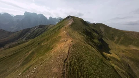 FPV drone fly over the hike trail on mountain ridge Stock Footage 282708376