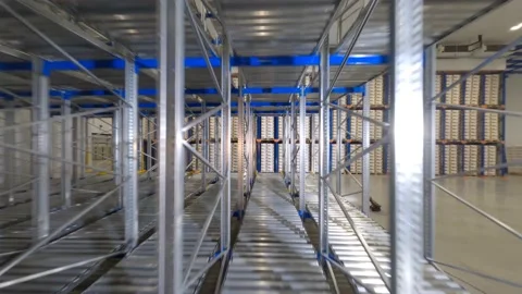 FPV Drone Flyes Through The Storage Shalves Stock Footage 162245769